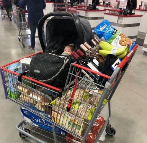 I always place the car seat in the main basket in the shopping cart .