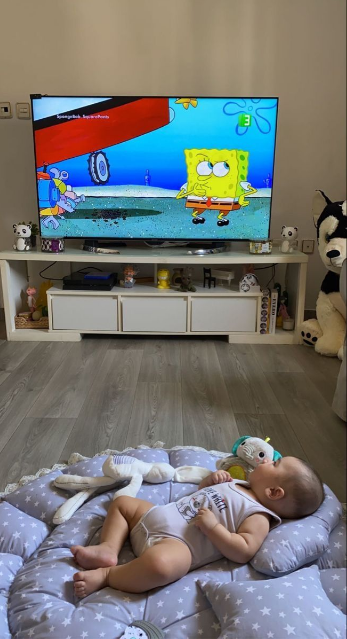 my elder son on TV , while i work on household chores and my younger 3 months old continuously watching tv